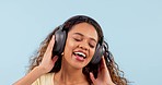 Headphones, happy and woman singing in a studio listening to music, playlist or radio for fun. Smile, dancing and young female person from Mexico streaming song or album isolated by white background.