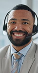 Happy businessman, face and call center in customer service, support or telemarketing at office. Closeup portrait of man, consultant or agent smile with headphones, online advice or help at workplace