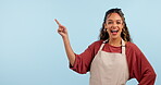 Studio woman, happy barista and point at cafeteria logo design, coffee shop promotion or cafe mockup space. Diner waitress, hospitality presentation portrait or server notification on blue background