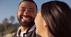 Happy, beach and couple laugh by ocean for commitment, bonding and relax together in nature. Marriage, travel and man and woman in conversation, talking and smile on holiday, vacation and sunset