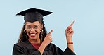 Happy woman, university graduation student or pointing up at studio commercial, learning achievement news or logo design. Promo direction, education notification or portrait person on blue background