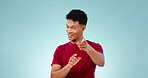 Happy man, applause and pointing to you in studio for congratulations isolated on a blue background mockup space. Portrait, clapping or person smile for achievement, winner and celebration of success