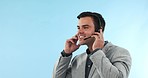 Call center, smile and man consultant in a studio working on an online consultation for sales. Customer support, contact us and young male telemarketing agent talking with headset by blue background.