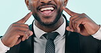 ??Mouth, teeth and closeup smile of man in studio isolated on a blue background. Happy face, pointing at lips and dental hygiene for tooth whitening, oral care or healthy gums for wellness at dentist