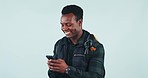 Cellphone, directions and black man in a studio for adventure, journey or tourist vacation with technology. Online map, phone and young African male model with backpack for hiking by white background