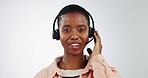 Callcenter, communication and CRM, black woman and face, phone call with telecom or customer service on white background. Contact us, help desk and talk, telemarketing sales and consultant in studio