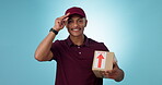 Box delivery, studio and happy man on logistics courier, product shipping or commercial post service. Export mail, package distribution and portrait person on supply chain order on blue background