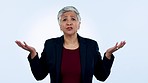 Business, choice and face of senior woman in studio confused with decision anxiety on blue background. Why, portrait and elderly female ceo show emoji hands, stress or doubt, mistake or dont know