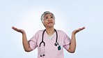 Confused, doubt and mature doctor in studio with hand gesture for decision, choice and options. Healthcare, nurse and portrait of woman shrug for question, unsure and uncertainty on blue background