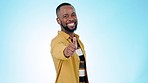 Black man, thumbs up and face, agreement and vote with support in studio, happy with feedback or review. Thank you, winner and smile for success with yes or like emoji isolated on blue background