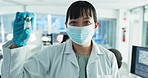 Scientist, woman and face mask with cure in a laboratory for healthcare and biotechnology with research work. Female person, professional and portrait with virus investigation and pharmaceutical job