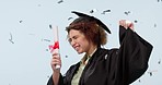 Graduate, celebration and woman in studio with confetti, excited, and cheer for success on blue background. University, college and portrait of student fist pump for education, certificate and award