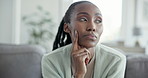 Black woman, thinking of future and relax on couch with dream, memory or remember and thoughtful at home. Ideas, decision and problem solving with solution for life, mindfulness and questions