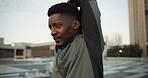 Fitness, health and stretching with a black man runner outdoor in a city for marathon or cardio training. Exercise, workout and a young athlete getting ready for the start of his workout for wellness