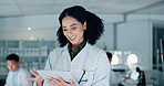 Scientist, woman and tablet for laboratory research, data analysis or typing test results or medical report. Doctor or science expert with digital technology for pharmaceutical development at night