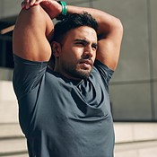 Man on city stairs for exercise, warm up and muscle workout for morning ...