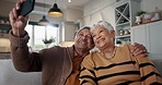 Senior couple, selfie and smile on sofa, hug and bonding with love, support and relax in retirement in home. Elderly woman, old man and happy with profile profile, web blog and social media on couch