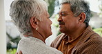 Senior couple, love and kiss with hug, embrace and intimacy at home, enjoying marriage and old age. Retirement, spending quality time together and bonding outdoors with smile, happiness and romance