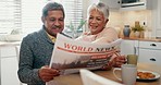 Senior couple, reading and newspaper in home with happy, announcement or story in global press and paper newsletter. People, together and morning in kitchen with news, conversation and report