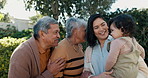 Mother, baby or grandparents hug in park for bonding, support or love in a happy family. Old man, mature woman or mom with a young daughter in outdoor garden or nature together on holiday vacation