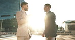 Men, colleagues and talking outside in corporate clothes, advice or career growth tips. Planning, teamwork and city buildings on commute, discussion and businessmen for collaboration, project or goal