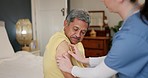 Old man, nurse help with plaster and elderly care, support and wound from injection with healthcare. Health, wellness and caregiver with patient, homecare and retirement with medicine and trust