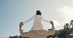 Beach piggyback, walking and father with child on shoulder, bonding and on outdoor morning journey, vacation or holiday. Freedom, Fathers Day love or back of happy dad, kid or family travel in nature