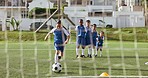 Sports team applause, soccer ball and child shooting practice for competition, target aim or youth development workout. Football player goal, group support motivation and kid training on grass field