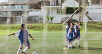 Soccer, girl kick and training for game and sport drill for workout and exercise on school field. Students, coaching and children with teamwork, player and team together with youth and athlete group