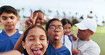 Selfie, children and comic face with coach on field for soccer game, training or competition outdoor in nature. Portrait, football and happiness for match win, challenge or exercise on sports ground