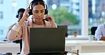 Laptop, customer service and a woman agent in a call center for support, help or assistance. Computer, contact us and crm with a young employee consulting in an office for telemarketing communication