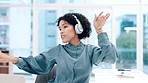 Business, headphones and woman dancing, celebration and laptop with achievement, promotion and streaming music. Person, worker and employee with a pc, headset and energy with motion, wow and sound