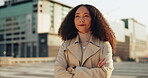 Vision, arms crossed and a business black woman in the city for freedom, opportunity or inspiration. Mindset, thinking and idea with a confident young employee in an urban town for future growth