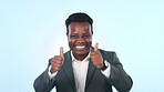 Black man in business, thumbs up and success with energy in portrait, support or agreement with dancing in studio. Happiness, trust and winner with positive feedback or review  on blue background