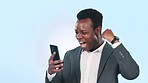 Black man in business, surprise for bonus on smartphone from work and promo on blue background. Corporate reward, online benefits and wow reaction for winning, excited shouting and success in studio