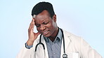 Man, doctor and headache or stress for healthcare results, hospital mistake and crisis on a blue background. Medical worker or african person with anxiety, pain and decision or clinic fail in studio