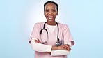 Happy, black woman and professional doctor with arms crossed against a studio background. Portrait of African female person, medical expert or healthcare nurse smile in confidence for health advice