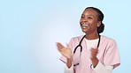 Happy black woman, doctor and applause in congratulations, winning or success against a studio background. Excited female person, healthcare or medical nurse clapping for thank you on mockup space