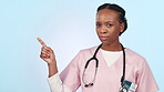 Doctor, face and serious in pointing to space in mockup, against bad habits, choices and judgement. Black female medic, shaking head and promo for medical advice and isolated in studio by background