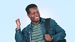 Happy, dance and black man in studio for celebration, good mood or victory on blue background. Excited, winner and African guy student with success, energy or news of loan, scholarship or achievement