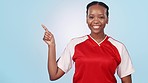 Sports woman, point and smile in studio, list or choice with with ok sign, good service and blue background. African girl, athlete and face for decision, emoji or icon for fitness, health or wellness