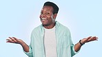 Choose, shrug and face of black man in studio with options, decision or balance expression. Happy, smile and portrait of young African male model with scale hand gesture isolated by white background.