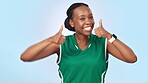 Sport, black woman and thumbs up in studio for motivation, happy dance or workout support with energy. Fitness, person or excited face for wellness, exercise and training on blue background or mockup