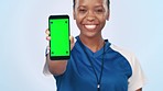 Happy black woman, phone and green screen for sports app or advertising against a studio background. Portrait of African female person or athlete showing mobile smartphone display or mockup space