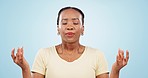 Breathing, meditation and black woman in a studio with zen, calm and peaceful personality. Yoga, breathe and African female model with relax exercise for chakra balance isolated by blue background.