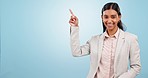 Face, smile and business woman with hand pointing in studio with presentation, deal or info on blue background. Happy, portrait and female recruiter show timeline, schedule or sign up checklist promo