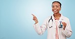 Doctor, woman and face with point in studio for list, menu and smile with pregnancy test by blue background. African medic, nurse and advice for healthcare, wellness and mockup space for promotion