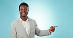 Face, business man and pointing to choice in studio for deal, checklist and review process on blue background. Portrait, happy worker and advertising launch of news, show menu and feedback of steps 