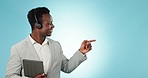 Black man, business telemarketing and tablet with pointing to deal and advertising for call center. Studio, blue background and crm communication with customer support and promo with consultant sale