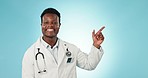Face, pointing or doctor with promotion, black man or healthcare on a blue studio background. Portrait, African person or medical professional with checklist, decision or opportunity with information
